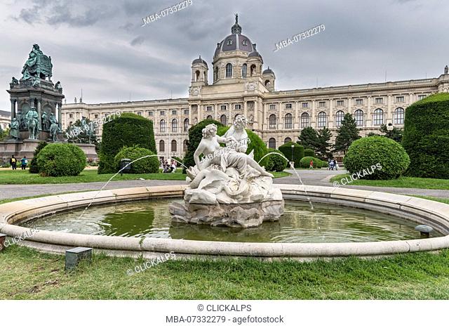 Vienna, Austria, Europe. Tritons and Naiads fountain on the Maria Theresa square with the Art History Museum in the background
