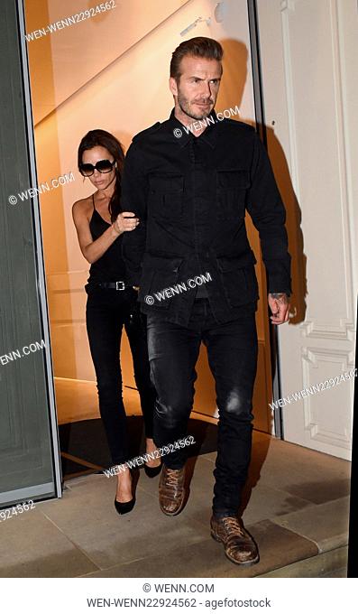 David and Victoria Beckham pictured leaving her flagship London store at 2am hand in hand after rumours surfaced that there relationship was under strain