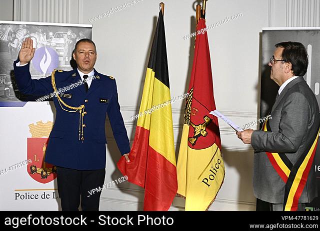 Liege Police Zone chief of staff Jean-Marc Demelenne and Liege Mayor Willy Demeyer are pictured during the swearing in of the new Head of the Liege Police Zone