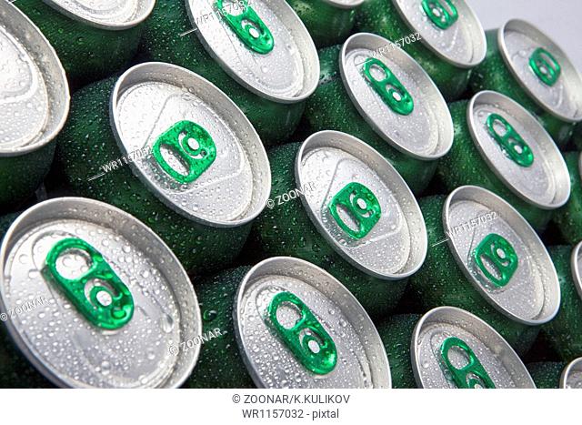 Aluminum cans in drops of water