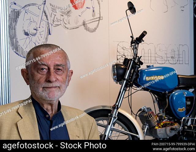 10 July 2020, Saxony, Zwickau: The designer Karl Clauss Dietel stands in the central exhibition of the 4th Saxon State Exhibition next to his moped S50