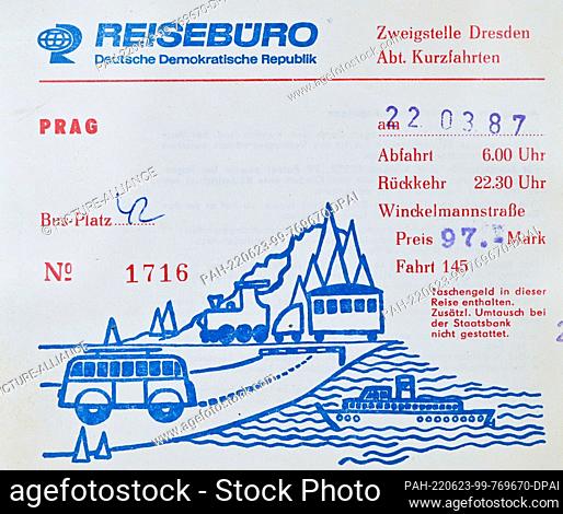 23 June 2022, Brandenburg, Eisenhüttenstadt: A bus ticket for a short trip from Dresden to Prague from the VEB Reisebüro der Deutschen Demokratischen Republik...