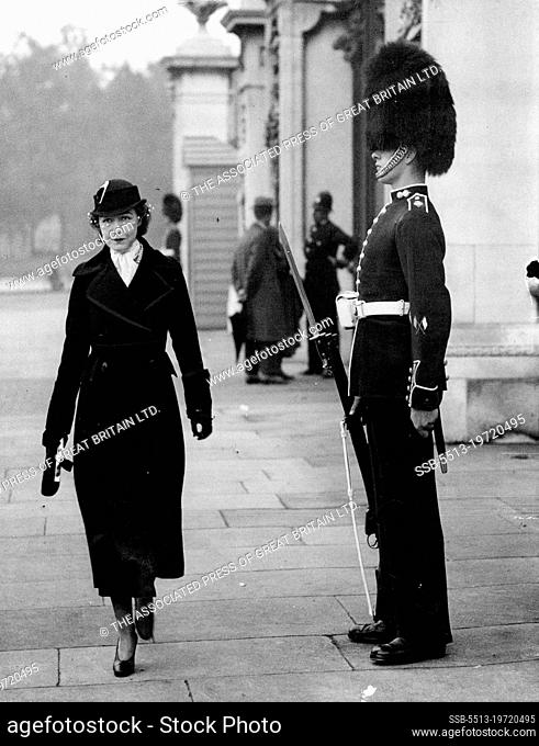 Gish wearing a smart military ***** and Shako-Like hat and ***** passing one of the sentries ***** Buckingham Palace.Miss Dorothy Gish, the film and ***** star