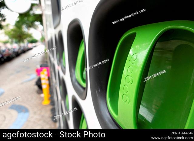 Taipei city, Taiwan - June 14th, 2020: charging station for battery packs of Taiwan-based Gogoro electronic motocycle at street in Taipei, Taiwan, Asia