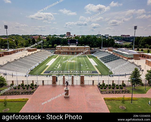 UNC Charlotte's Division I FCS football team kicked off in 2013. It plays at Jerry Richardson Stadium, which holds approximately 15