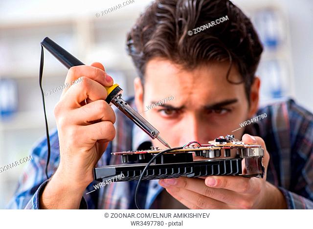 Computer hardware repair and fixing concept by experienced technician