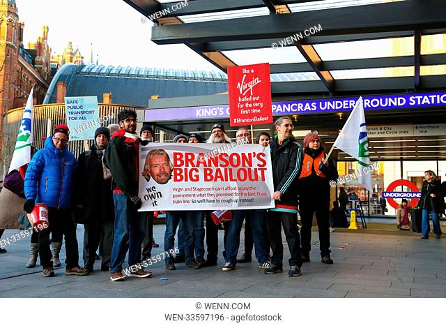 Protestors at Kings Cross station demonstrating against Virgin and Stagecoach who have changed their minds about running the East Coast line