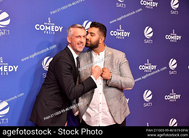 01 October 2021, North Rhine-Westphalia, Cologne: Cabaret artist Sebastian Pufpaff and Faisal Kawusi come to the German Comedy Award 2021 ceremony Photo: Horst...