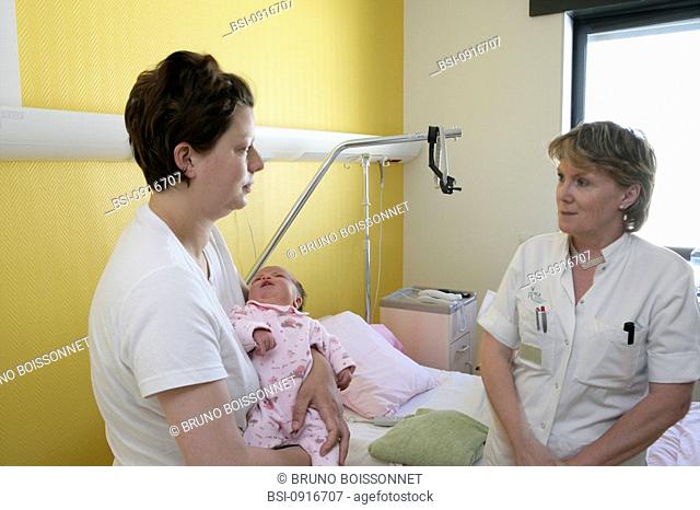 MATERNITY HOSPITAL Photo essay at the hospital of Meaux 77, France. Department of maternity. A mother is talking with a pediatric nurse