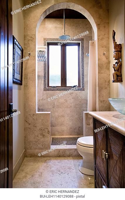 Bathroom with shower and commode at home; Dana Point; California; USA