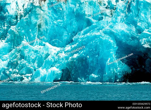 Glacier ice takes on a blue color in the sunshine