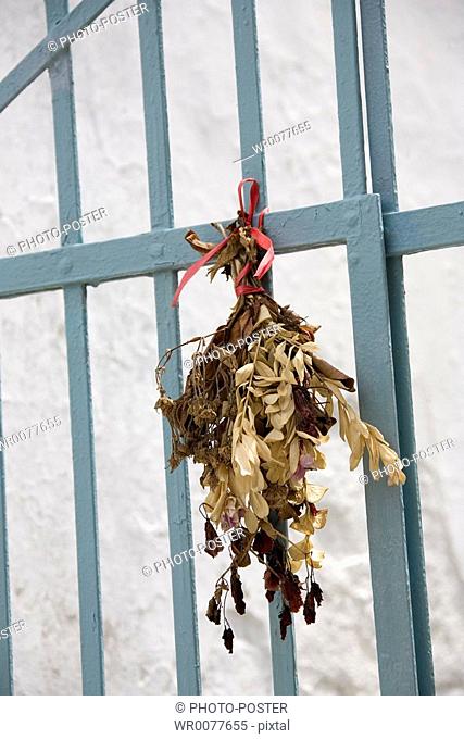 dried flower-bouquet at the yard entrance