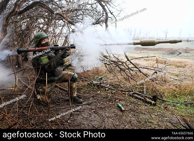 RUSSIA, DONETSK PEOPLE'S REPUBLIC - DECEMBER 11, 2023: A serviceman fires a rocket launcher as team training takes place for combat units of the 9th Motor Rifle...