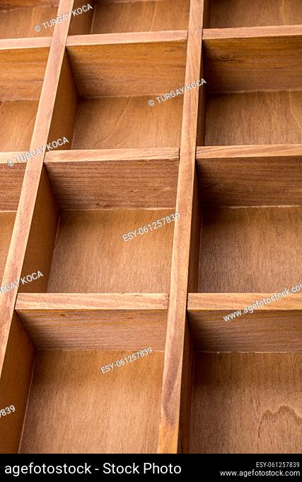 Close up of a wooden box with compartments