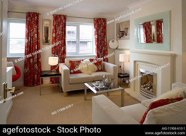 Living room with floral patterned and co-ordinating soft furnishings in Mews Style Houses, Misterton and Retford, Nottinghamshire, UK