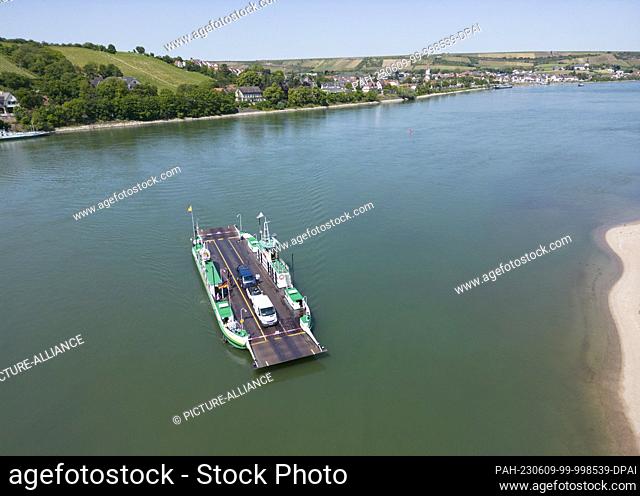 PRODUCTION - 05 June 2023, Hesse, Trebur: The Rhine ferry ""Landskrone"" docks in Trebur, Hesse. The ferry is struggling with economic difficulties