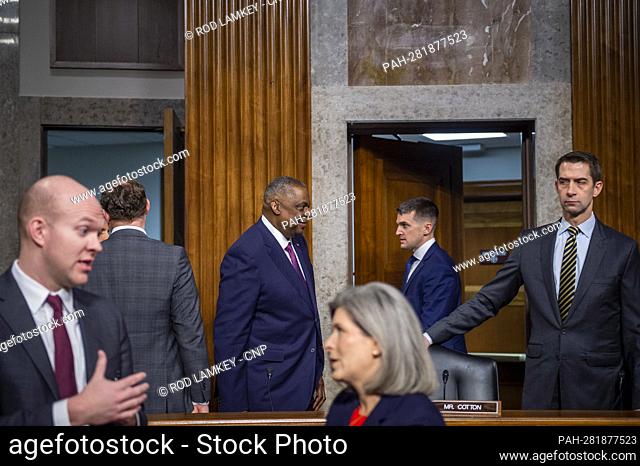 Secretary of Defense Lloyd Austin III, center, arrives for a Senate Committee on Foreign Relations hearing to examine the Department of Defense budget posture...