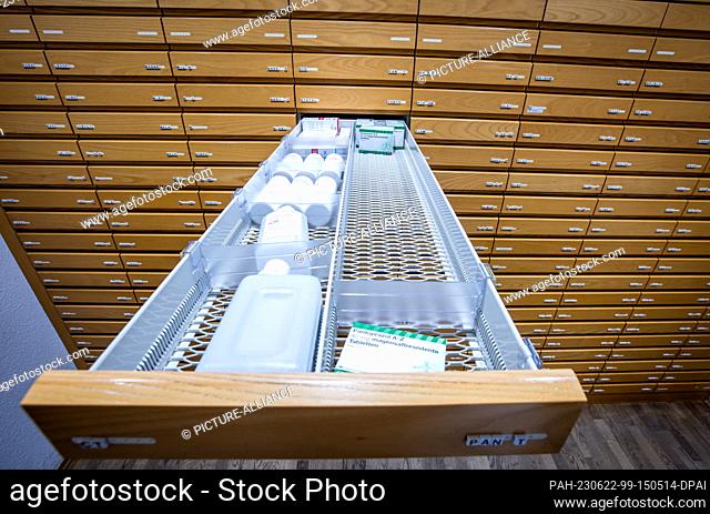 PRODUCTION - 30 May 2023, Mecklenburg-Western Pomerania, Schwerin: A half-empty drawer of prescription medicines for stomach ailments in a pharmacy cabinet at...