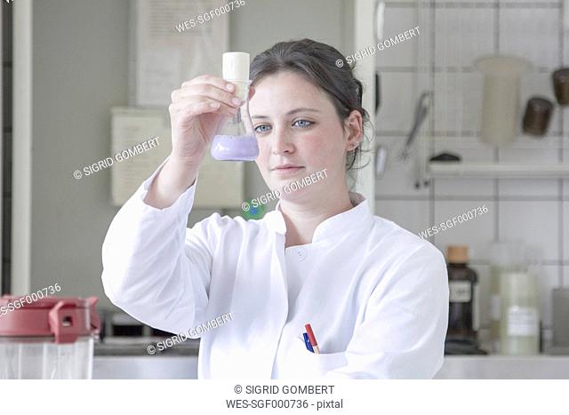 Portrait of female food analyst working in laboratory