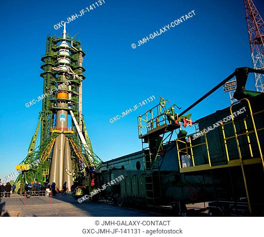 The Soyuz TMA-15M spacecraft is seen after the gantry arms closed to secure the rocket on the launch pad on Friday, Nov. 21