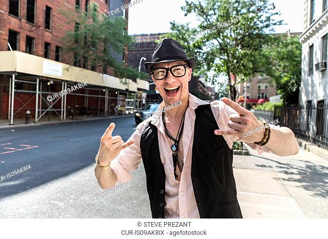 Funky man in street, New York City, US