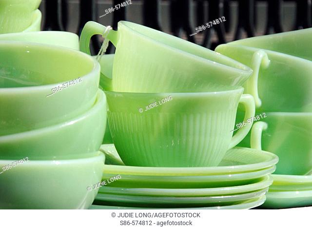 1950's Vintage Green Glass Dishes displayed at an outdoor flea market