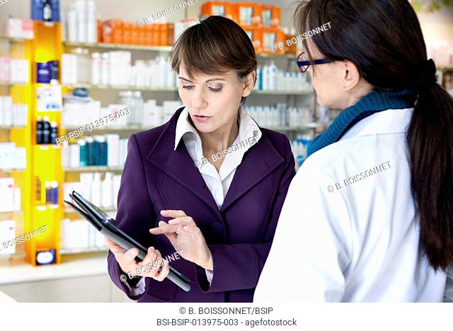 Medical representative with a pharmacist