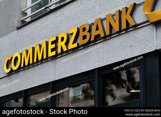 12 October 2021, Berlin: Part of the illuminated letters of the Commerzbank lettering above a recently closed branch on Kottbusser Damm in the Kreuzberg...