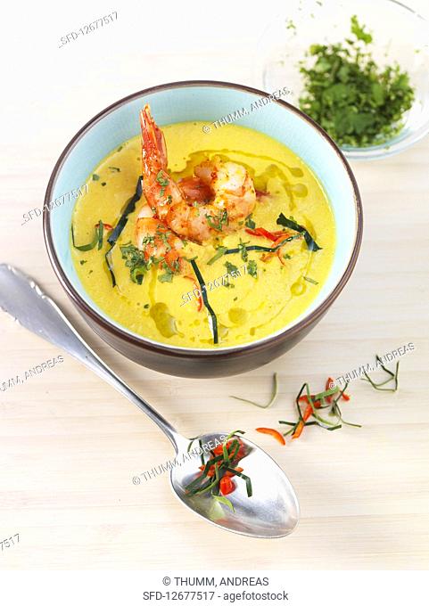 Ginger, carrot and coconut soup with prawns