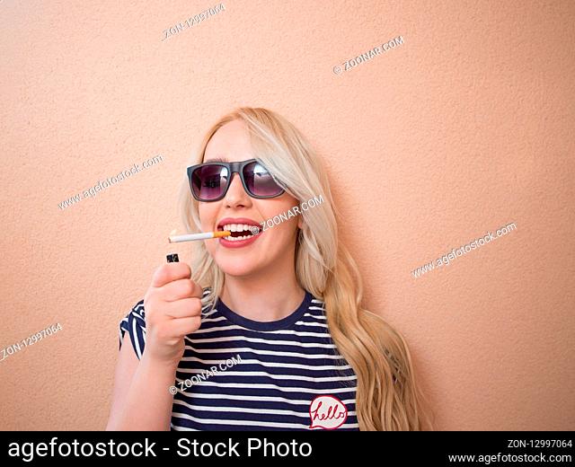 Hipster teenage girl with cigarette