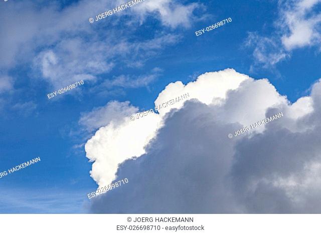 Blue sky and clouds give a harmonic background