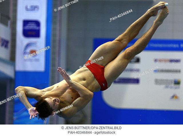 Illja Kwascha from Ukraine jumps off the one metre board during the men's diving finale at the European Diving Championships in Rostock, Germany, 19 June 2013
