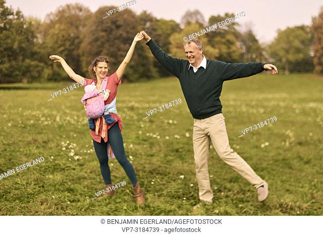 couple, baby, family, age difference, outdoors, in park, generations, Grandfather, at Neuhofener Berg, Munich, Germany