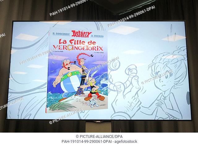 13 December 2019, France (France), Vanves: The next Astrix issue ""La fille de Vercingetorix"" will be presented on a video screen at the Hachette Livre...