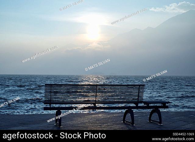Bench on Waterfront with Sunlight in Ascona, Switzerland
