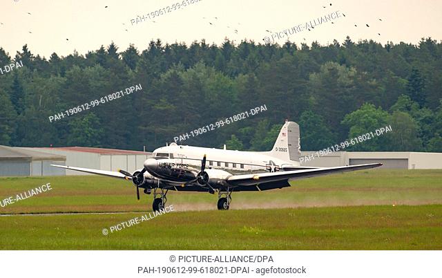 12 June 2019, Lower Saxony, Faßberg: A historic Douglas DC-3 also known as the ""Raisin Bomber"" lands on the grounds of the Bundeswehr Faßberg air base