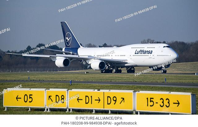 A Lufthansa Boeing 747-8 featuring the company's new crane logo landing at the Helmut Schmidt Airport in Hamburg, Germany, 08 February 2018