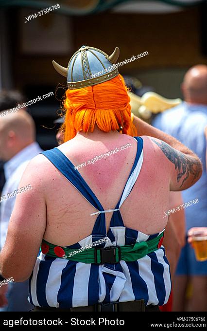 Illustration picture shows the sunburnt back of a man dressed as cartoon figure Obelix during the first day of the Tomorrowland electronic music festival