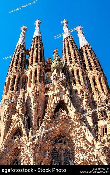 Barcelona, Spain - May 3, 2016: Tourist visiting Cathedral of La Sagrada Familia on May 3, 2016 in Barcelona, Spain. It is designed by architect Antonio Gaudi...