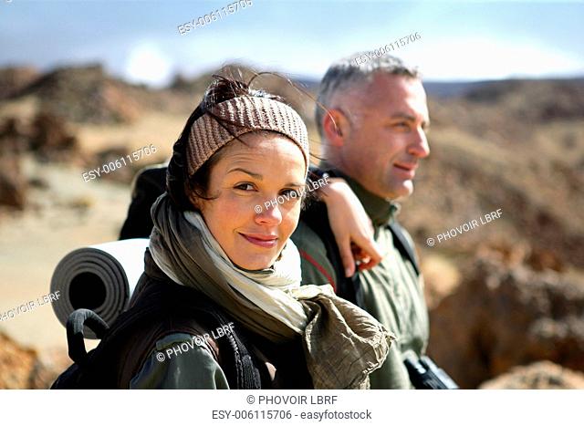 Couple hiking through the wilderness