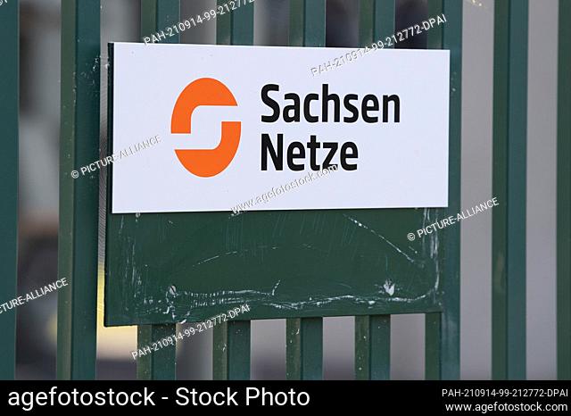 14 September 2021, Saxony, Dresden: A sign reading ""Sachsen Netze"" hangs on a gate in front of the site of the Dresden South feed-in substation
