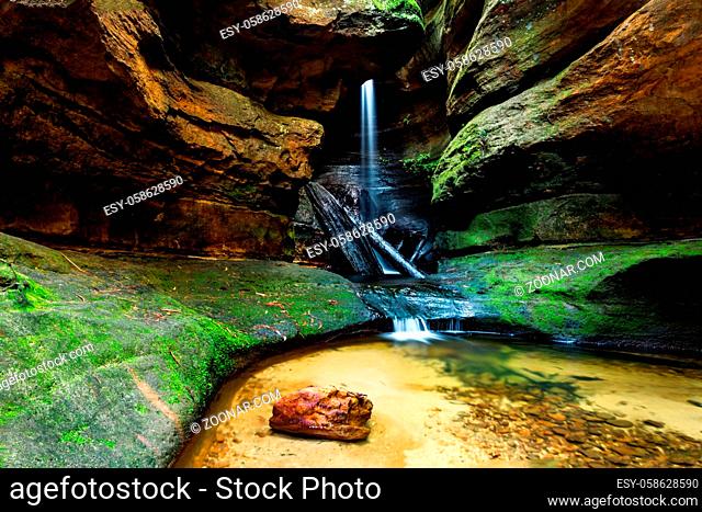 Waterfall in Centennial Glen Canyon in Blackheath Australia. Beautiful rock shapes eroded by the water over time