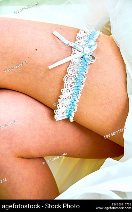 bride legs with blue stripes