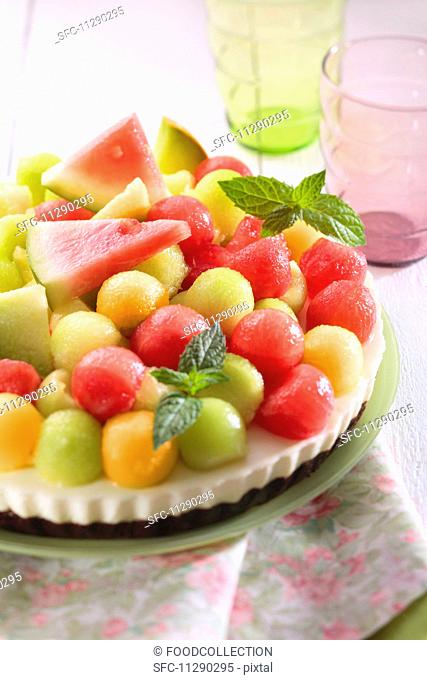 Cream cheese cake topped with colourful melon balls