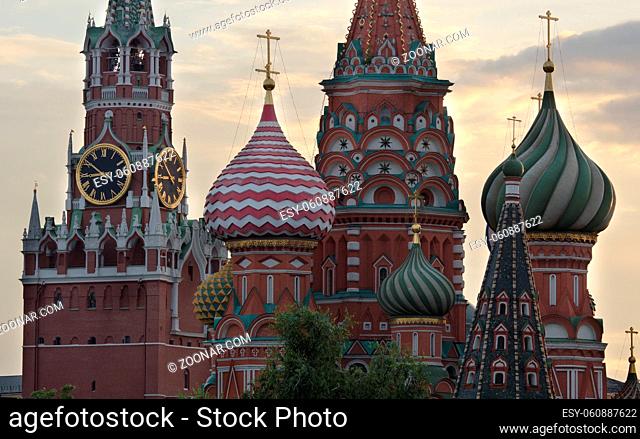 Moscow Russia View on Kremlin Towers and St Basil Cathedral, on against cloudy sky