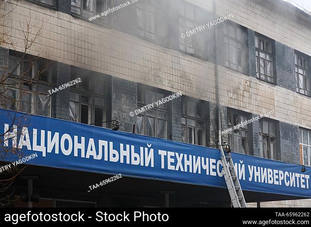 RUSSIA, DONETSK - DECEMBER 21, 2023: Smoke billows from Building 3 of the Donetsk National Technical University after a military strike