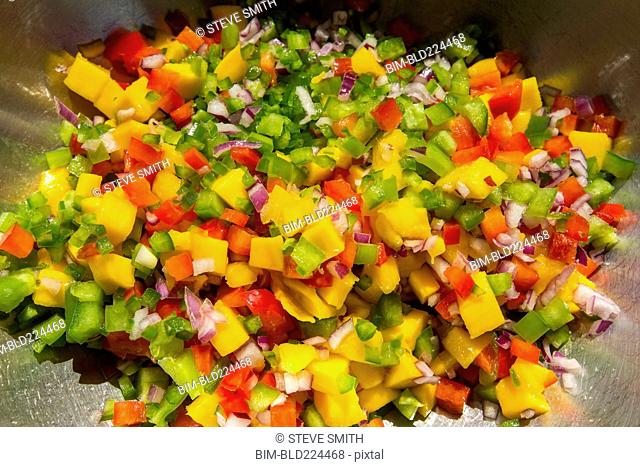 Diced peppers and onions in bowl