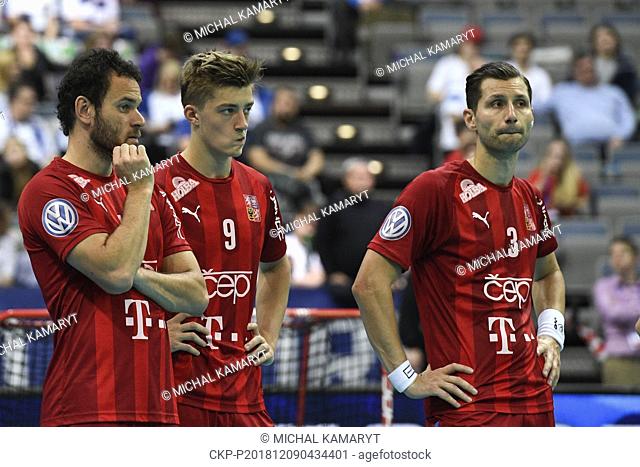 L-R Disappointed Czech players Jiri Curney, Filip Langer and Daniel Sebek after the Men's World Floorball Championships match for third place Czech Republic vs...
