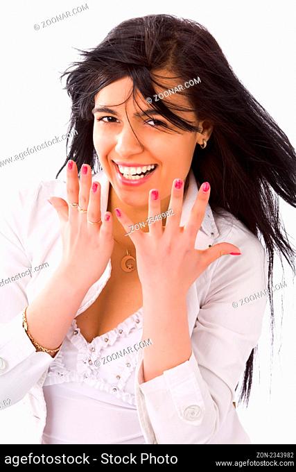 Excited girl laughing aloud hiding face isolated on white