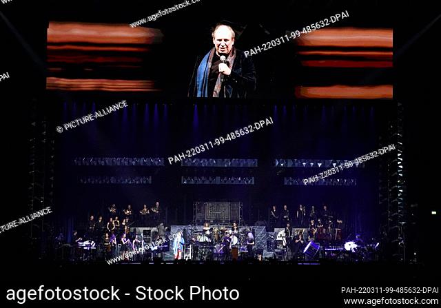 11 March 2022, Hamburg: German film composer Hans Zimmer welcomes the audience on stage at Barclays Arena. Oscar winner Zimmer has started his ""Hans Zimmer...